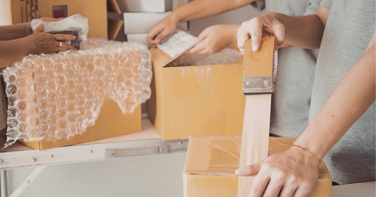 People packing to move house